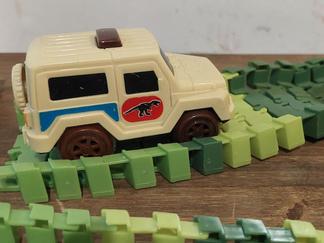 Pista de auto-flexible